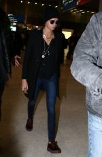 CARA DELEVINGNE at Charles De Gaulle Airport in Paris 03/04/2017