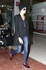 CARA DELEVINGNE at Charles De Gaulle Airport in Paris 03/04/2017