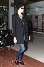 CARA DELEVINGNE at Charles De Gaulle Airport in Paris 03/04/2017