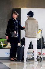 CARA DELEVINGNE at Charles De Gaulle Airport in Paris 03/20/2017