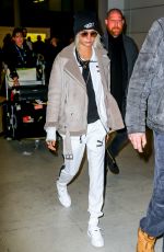 CARA DELEVINGNE at Charles De Gaulle Airport in Paris 03/20/2017