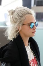 CARA DELEVINGNE at Heathrow Airport in London 03/26/2017