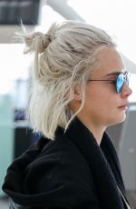 CARA DELEVINGNE at Heathrow Airport in London 03/26/2017