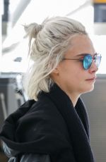CARA DELEVINGNE at Heathrow Airport in London 03/26/2017