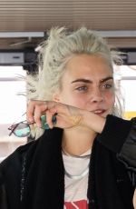 CARA DELEVINGNE at Heathrow Airport in London 03/26/2017