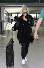 CARA DELEVINGNE at Heathrow Airport in London 03/26/2017