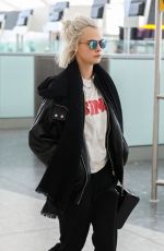 CARA DELEVINGNE at Heathrow Airport in London 03/26/2017