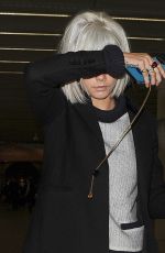CARA DELEVINGNE at Kings Cross Station in London 03/08/2017