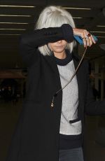CARA DELEVINGNE at Kings Cross Station in London 03/08/2017