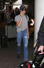 CARA DELEVINGNE at LAX Airport in Los Angeles 02/27/2017