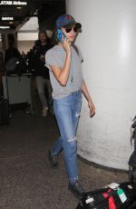 CARA DELEVINGNE at LAX Airport in Los Angeles 02/27/2017