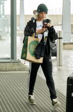 CARA DELEVINGNE at Heathrow Airport in London 03/12/2017