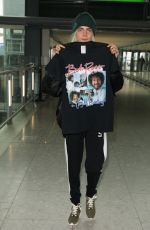 CARA DELEVINGNE at Heathrow Airport in London 03/12/2017