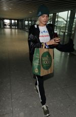 CARA DELEVINGNE at Heathrow Airport in London 03/12/2017