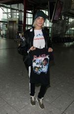 CARA DELEVINGNE at Heathrow Airport in London 03/12/2017