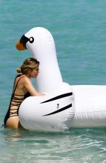 CATHY HUMMELS and Sister VANESSA FISCHER in Swimsuits at a Beach in Miami 03/22/2017
