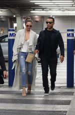 CHRISSY TEIGEN at Airpot in Miami 03/03/2017