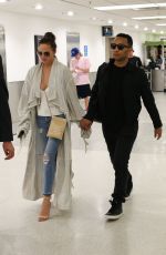 CHRISSY TEIGEN at Airpot in Miami 03/03/2017
