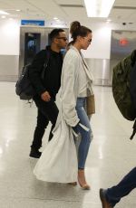 CHRISSY TEIGEN at Airpot in Miami 03/03/2017