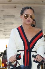 CHRISSY TEIGEN at LAX Airport in Los Angeles 03/16/2017