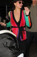 CHRISSY TEIGEN at LAX Airport in Los Angeles 03/23/2017