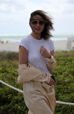 CHRISSY TEIGEN Out on the Beach in Miami 03/04/2017