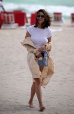 CHRISSY TEIGEN Out on the Beach in Miami 03/04/2017