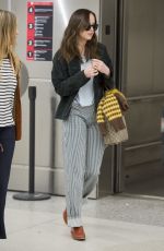 DAKOTA JOHNSON Ariives at Airport in Miami 03/29/2017