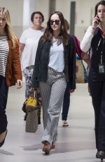 DAKOTA JOHNSON Ariives at Airport in Miami 03/29/2017