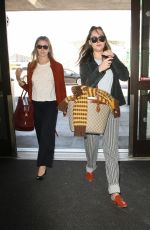 DAKOTA JOHNSON at Los Angeles International Airport 03/29/2017