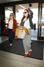 DAKOTA JOHNSON at Los Angeles International Airport 03/29/2017