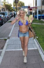 DANNIELLA WESTBROOK inDenim Shorts and Bikini Top Leaves Tantrum Beauty Salon in Marbella 03/11/2017