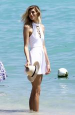 DEVON WINDSOR on the Set of a Photoshoot on the Beach in Miami 03/28/2017