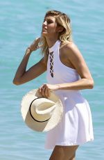 DEVON WINDSOR on the Set of a Photoshoot on the Beach in Miami 03/28/2017