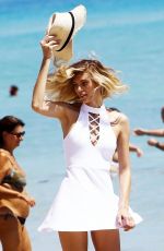 DEVON WINDSOR on the Set of a Photoshoot on the Beach in Miami 03/28/2017