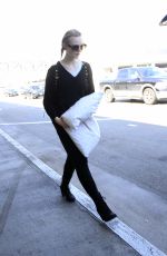 ELLE FANNING at Los Angeles International Airport 03/13/2017