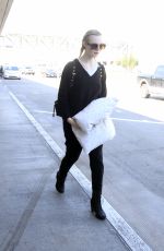 ELLE FANNING at Los Angeles International Airport 03/13/2017