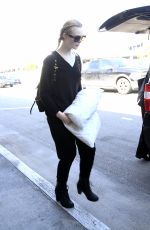 ELLE FANNING at Los Angeles International Airport 03/13/2017