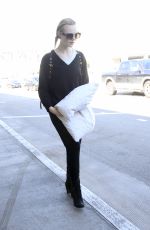 ELLE FANNING at Los Angeles International Airport 03/13/2017