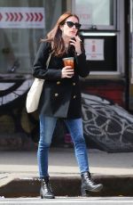 EMMA ROBERTS Smokes a Cigarette Out in New York 03/30/2017