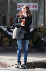 EMMA ROBERTS Smokes a Cigarette Out in New York 03/30/2017