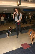 HILARY SWANK with Her Dogs at LAX AIrport in Los Angeles 03/07/2017