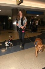 HILARY SWANK with Her Dogs at LAX AIrport in Los Angeles 03/07/2017