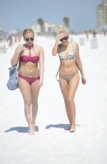 KATE ENGLAND and NAOMI WOODS in Bikinis on the Beach in Miami 03/01/2017
