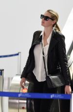 KATE UPTON at LAX airport in Los Angeles 03/10/2017