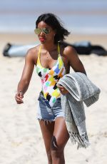 KELLY ROWLAND in Swimsuit on the Beach in Sydney 03/27/2017