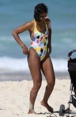 KELLY ROWLAND in Swimsuit on the Beach in Sydney 03/27/2017