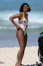 KELLY ROWLAND in Swimsuit on the Beach in Sydney 03/27/2017