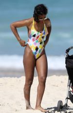 KELLY ROWLAND in Swimsuit on the Beach in Sydney 03/27/2017