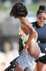 KELLY ROWLAND in Swimsuit on the Beach in Sydney 03/27/2017